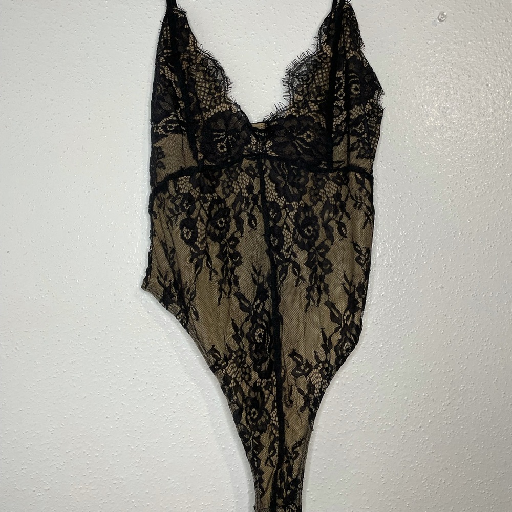 Black lace body  / never worn / size S